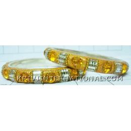 KKLK01C34 Pair of lac bangles with glitter n stone handiwork.